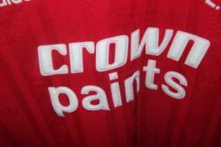   Players wearing RED CROWN PAINTS jerseys from the 11980s