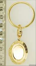 YBM oval engraved locket, Greek key connector  