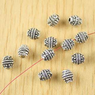 description: 60pcs Tibetan silver studded oval spacer beads H2613