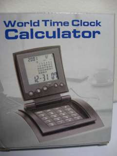Saturn World Time Clock and Calculator all in one  