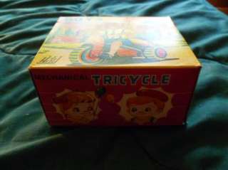   BOXED GIRL ON TRICYCLE WORKING WIND UP TIN LITHO TOY HERO TOY  