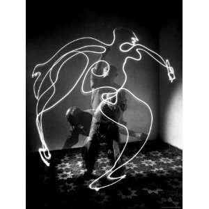  of Artist Pablo Picasso Using Flashlight to Make Light Drawing 