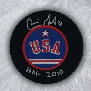  CAMMI GRANATO USA Hockey SIGNED Olympic PUCK w HOF 2010 