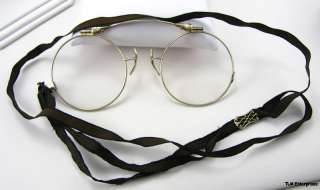   bidding consideration is this fine, vintage pair of folding glasses