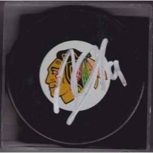  Jonathan Toews Signed Hockey Puck   Logo   Autographed NHL 