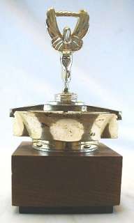 Vintage car show rally parade trophy award from 1969 showing a silver 