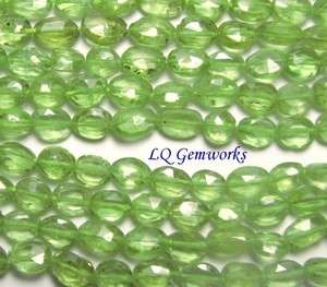 14 AA PERIDOT 6 7mm Faceted Oval Beads  