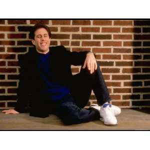  Comedian Jerry Seinfeld Reclining by Brick Wall Stretched 