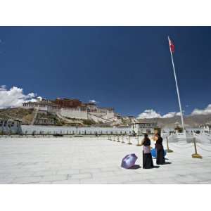 Two Tibetan Women Praying, in Front of the Potala Palace, Unesco World 